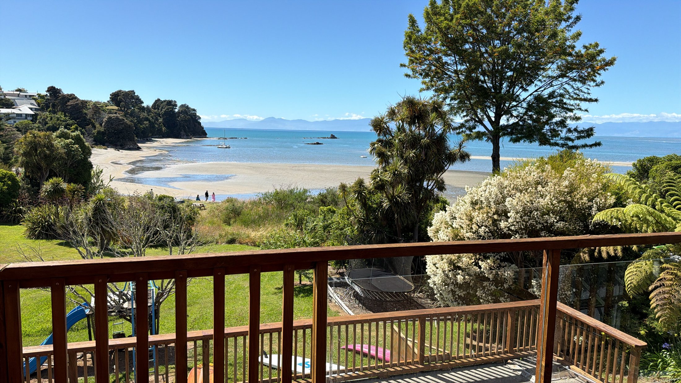 View from the deck across Little Kaiteriteri beach and Tasman Bay
