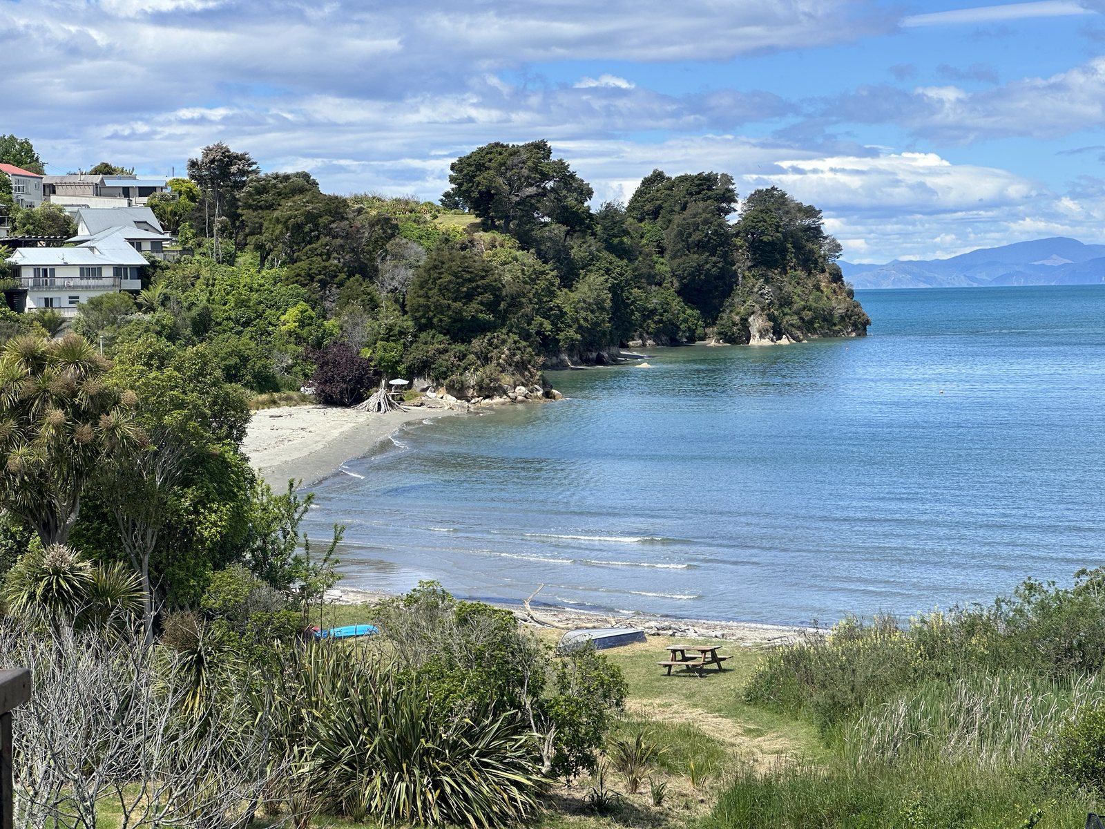 Little Kaiteriteri bay with clear water and beach below